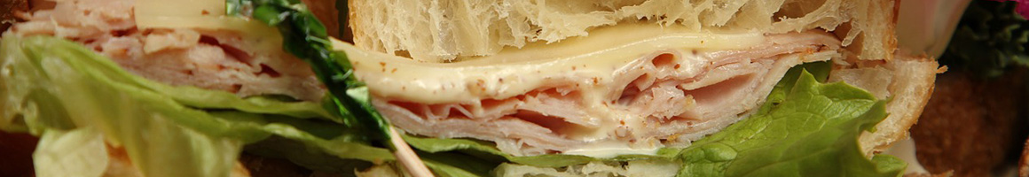 Eating Deli Gluten-Free Sandwich at Elm Street Market restaurant in Bennington, VT.
